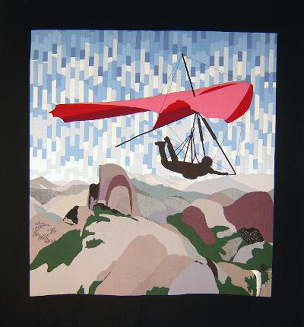 Gallery 4 - pictorial quilt depicting a red hangglider soaring over Yosemite Valley